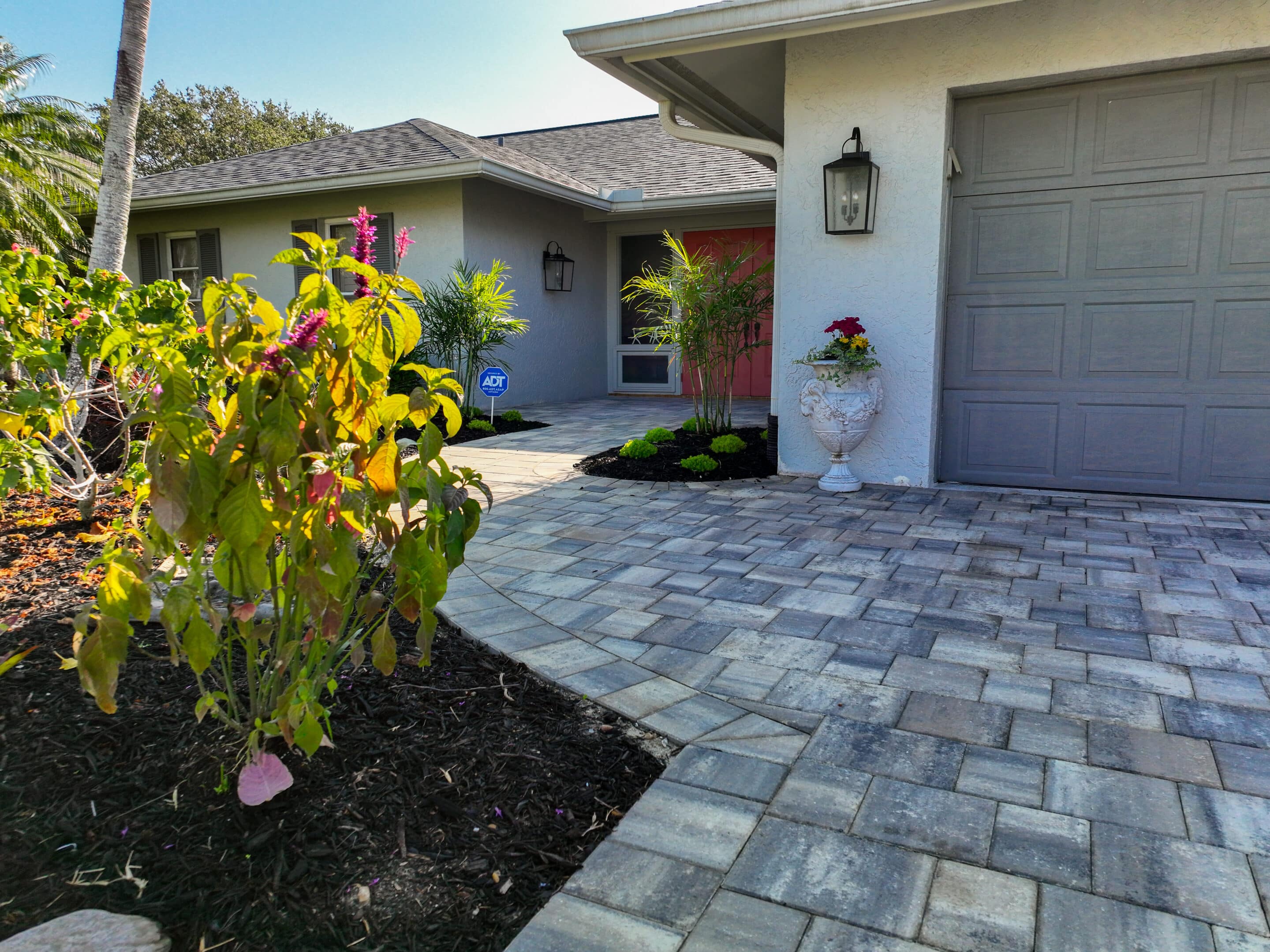 Beautiful Thick Interlocking Concrete Paver Driveway and Walkway Transformation in Naples