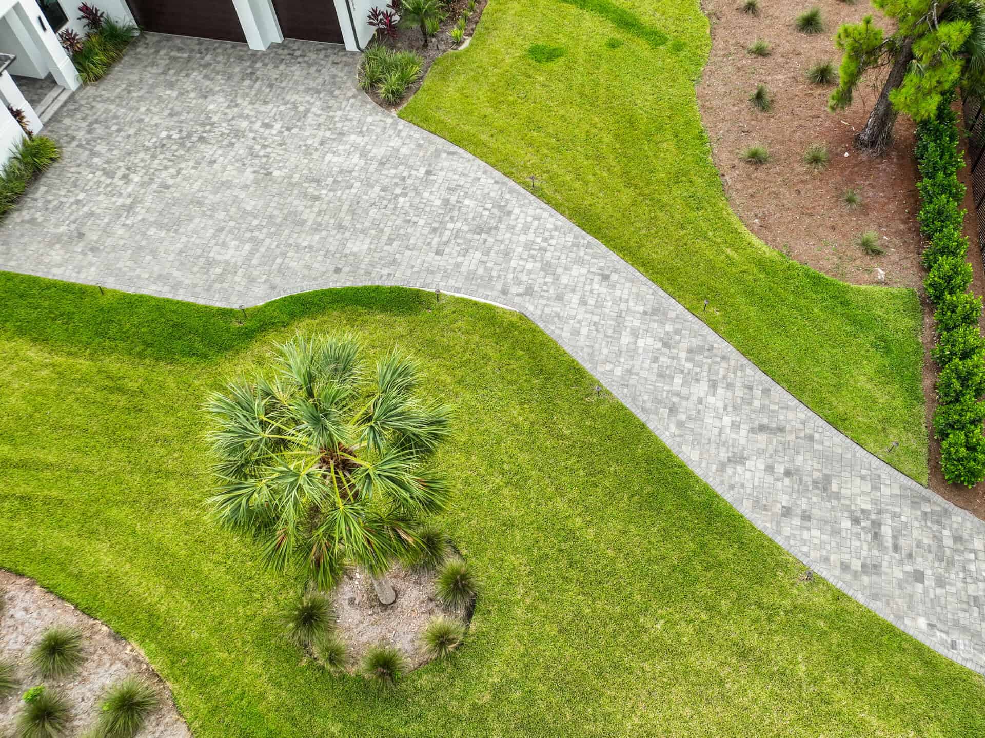 arial photograph of a driveway paved by accurate pavers